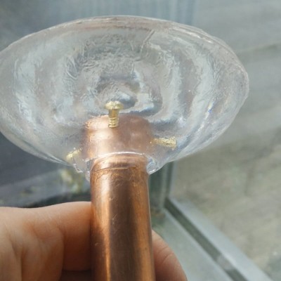 The copper pipe embedded into the resin