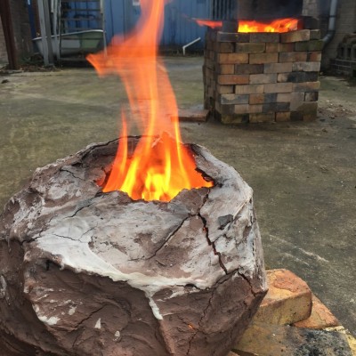 Firing the 'Cracked  Earth ' kiln